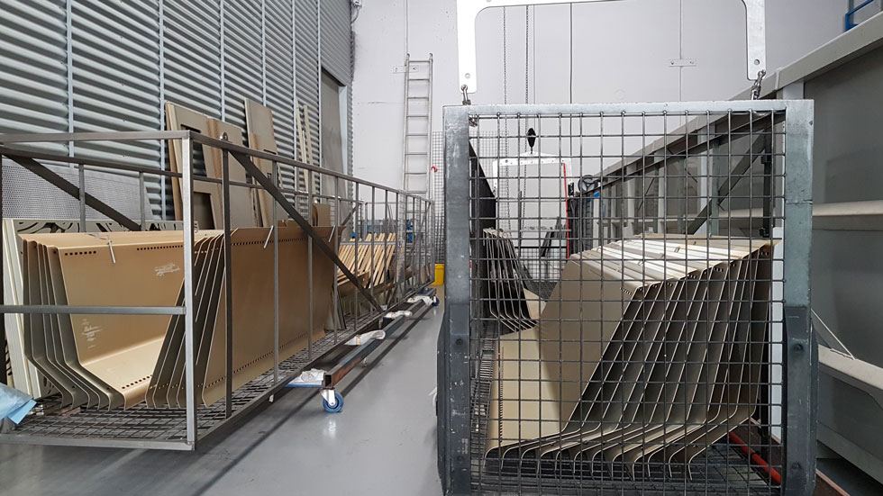 Aluminium on racks after pre-treatment